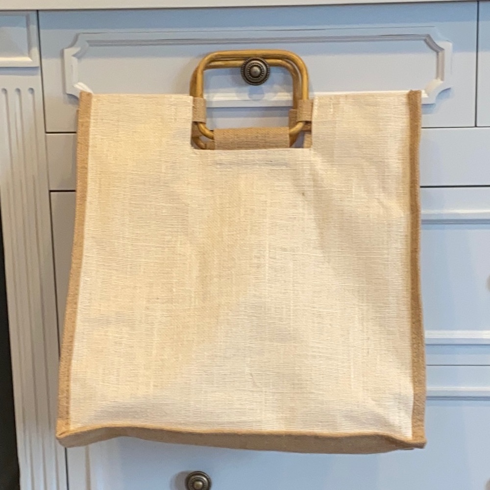 Burlap and wood handled  tote bag.